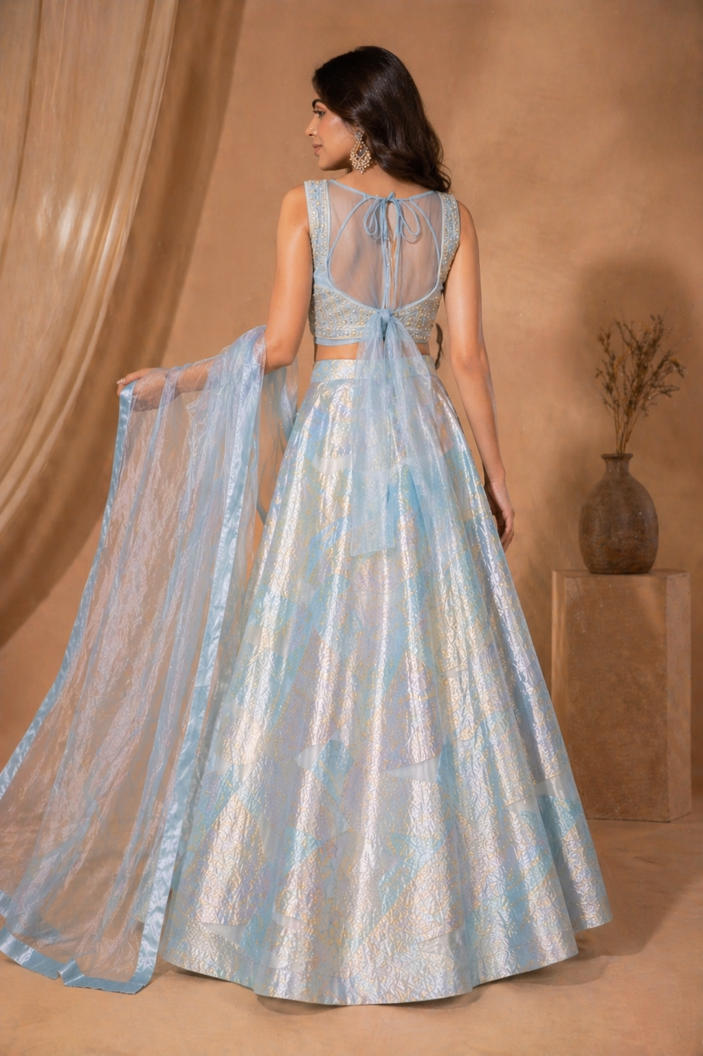 Pastel Blue Brocade Lehenga Set with Sleeveless Blouse
